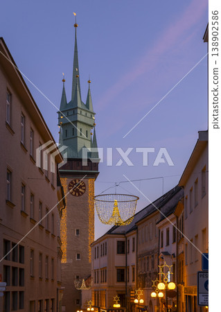Znojmo old town hall tower illuminating festive street decorations Znojmo old town hall tower illuminating festive street decorations 138902586