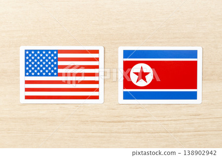 American and North Korean flags placed on the table 138902942