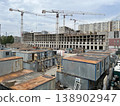 Urban Construction Zone with On-Site Accommodation Trailers and Crane 138902947