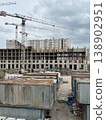 Construction Site with Temporary Worker Trailers and Tower Crane 138902951