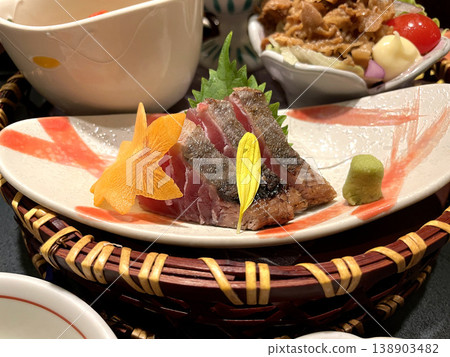 Seared Bonito - Japanese Sashimi Plate with Condiments and Flower-Shaped Garnish Seared Bonito - Japanese Sashimi Plate with Condiments and Flower-Shaped Garnish 138903482