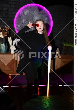 Individual woman exuding confidence amid lively artistic environment Individual woman exuding confidence amid lively artistic environment 138903531