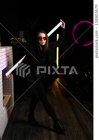An animated silhouette illuminated by vibrant neon amid urban landscape An animated silhouette illuminated by vibrant neon amid urban landscape 138903670