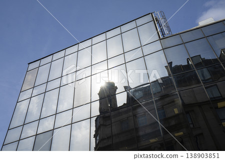 the reflections of the sun on the windows of a modern building in Dublin, Ireland the reflections of the sun on the windows of a modern building in Dublin, Ireland 138903851