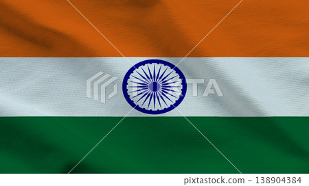 Symbol of sovereignty, Indias national flag billows in the wind against a clear sky 138904384