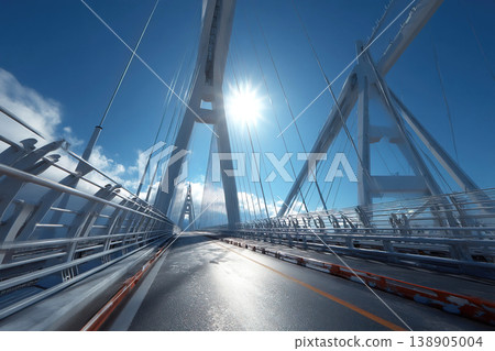 Modern bridge showcasing advanced technology against a bright blue sky Modern bridge showcasing advanced technology against a bright blue sky 138905004