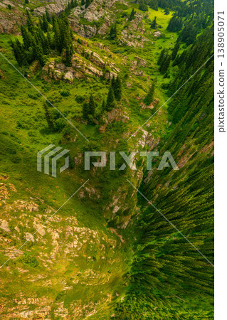 Majestic landscape of mountains and lush greenery in Kyrgyzstan Majestic landscape of mountains and lush greenery in Kyrgyzstan 138905071