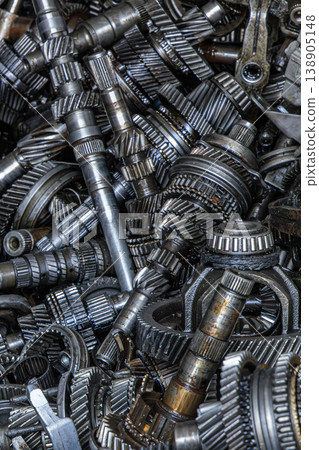 Close-up of used automotive transmission parts and gears 138905148