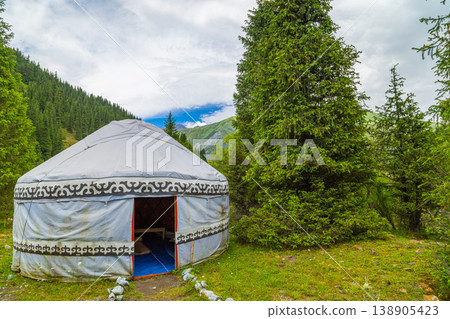 Traditional yurt in serene forest meadow, Kyrgyzstan Traditional yurt in serene forest meadow, Kyrgyzstan 138905423