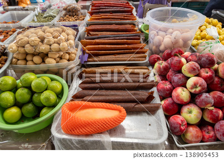 Colorful dried fruit rolls at outdoor market in Kyrgyzstan Colorful dried fruit rolls at outdoor market in Kyrgyzstan 138905453