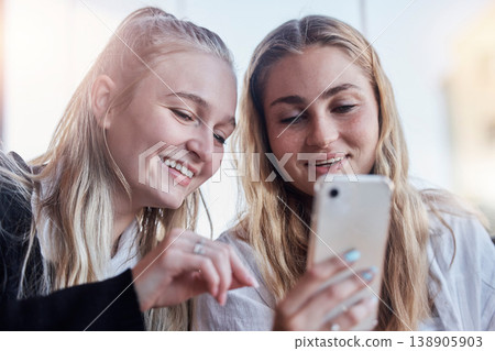 Phone, social media and friends laughing at trending meme on the internet, web or website together outdoors in a city. People, app and women scrolling online sharing or streaming a video Phone, social media and friends laughing at trending meme on the internet, web or website together outdoors in a city. People, app and women scrolling online sharing or streaming a video 138905903