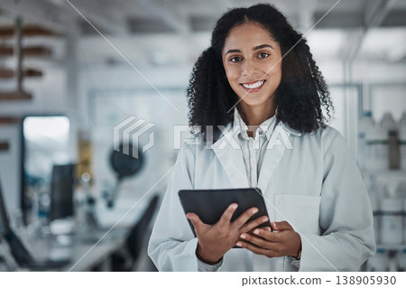 Science, research and portrait of black woman with tablet and smile in laboratory, internet and medical data search online. Healthcare, pharmaceutical innovation and happy scientist with technology Science, research and portrait of black woman with tablet and smile in laboratory, internet and medical data search online. Healthcare, pharmaceutical innovation and happy scientist with technology 138905930
