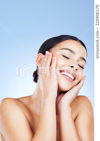 Beauty, skincare and mockup with face of woman for spa treatment, facial and cosmetics. Health, wellness and smile with girl model and happy for relax, self care and glow in blue background studio Beauty, skincare and mockup with face of woman for spa treatment, facial and cosmetics. Health, wellness and smile with girl model and happy for relax, self care and glow in blue background studio 138906176