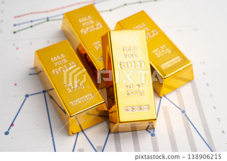 Gold bars on graph, finance trading investment business currency. Gold bars on graph, finance trading investment business currency. 138906215
