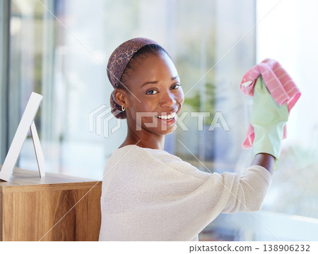 Portrait, black woman and cleaning glass in home with smile for hygiene, fresh or wipe clear with cloth. African American female, lady and cleaner being happy, domestic and window dusting and chores Portrait, black woman and cleaning glass in home with smile for hygiene, fresh or wipe clear with cloth. African American female, lady and cleaner being happy, domestic and window dusting and chores 138906232
