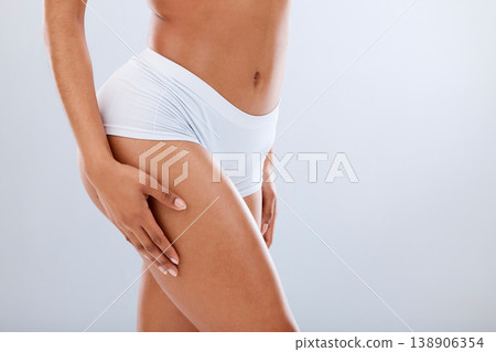 Body, beauty and black woman thigh with mockup, health and diet with skin glow. Isolated, white background and studio with model after leg cellulite, liposuction and cosmetic treatment with mock up 138906354