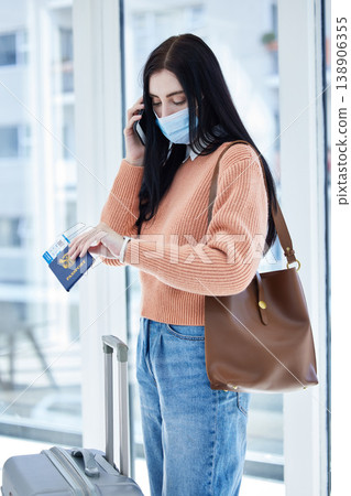 Covid, travel and passport with woman in face mask and phone call for immigration law, corona virus airport policy. Person with suitcase check time on watch with document problem, covid 19 compliance 138906355