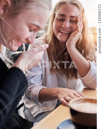 Coffee shop, funny couple of friends on social date or conversation in morning for gen z lifestyle. Young people or women laugh, talking together with latte cup in cafe or restaurant on student break Coffee shop, funny couple of friends on social date or conversation in morning for gen z lifestyle. Young people or women laugh, talking together with latte cup in cafe or restaurant on student break 138906372