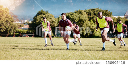 Game, sports and men playing rugby in a competition, match and running with a ball on a field. Fitness, exercise and players training for a team sport, cardio and collaboration in a park for practice 138906416