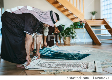 Prayer, mat and islam with people in home for salaah, guidance and Ramadan Kareem. Eid mubarak celebration, worship and muslim faith with family in living room of house for praise and religion Prayer, mat and islam with people in home for salaah, guidance and Ramadan Kareem. Eid mubarak celebration, worship and muslim faith with family in living room of house for praise and religion 138906574