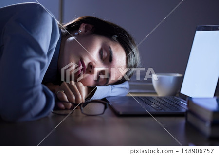 Tired, sleep and business woman in office resting after working on laptop mockup at night. Sleeping, relax and female employee with fatigue, burnout or exhausted, overworked and nap, asleep or sleepy Tired, sleep and business woman in office resting after working on laptop mockup at night. Sleeping, relax and female employee with fatigue, burnout or exhausted, overworked and nap, asleep or sleepy 138906757