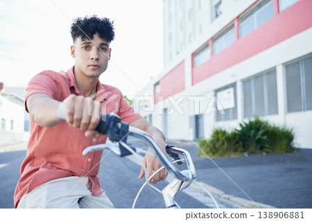 Man on bicycle in the street, eco friendly and sustainability with an urban background. Transportation, gen z and trendy youth in cityscape portrait, environment safety and clean energy lifestyle. 138906881