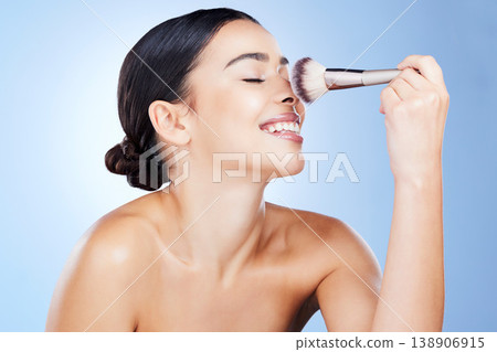 Makeup, beauty and woman with brush happy on blue background for cosmetics, powder and foundation. Cosmetology, skincare and girl face with application tools for facial products, treatment and salon Makeup, beauty and woman with brush happy on blue background for cosmetics, powder and foundation. Cosmetology, skincare and girl face with application tools for facial products, treatment and salon 138906915