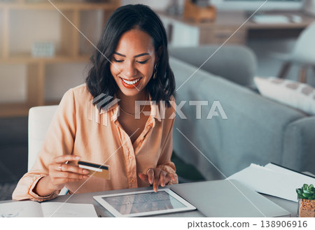 Shopping for online purchase with credit card and tablet, buying products for house and making payment with technology. Smiling and cheerful woman holding debit card for banking, budget and bills Shopping for online purchase with credit card and tablet, buying products for house and making payment with technology. Smiling and cheerful woman holding debit card for banking, budget and bills 138906916
