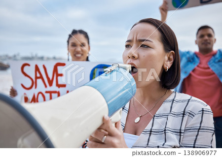 Climate change, megaphone and Asian woman protest with crowd protesting for environment and global warming. Save the earth, group activism and female shouting on bullhorn to stop planet pollution. 138906977