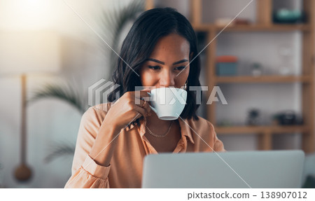 Thinking, planning and working from home on laptop while entrepreneur drinks coffee, tea or hot drink to help concentrate. Freelance blogger or writer with vision ideas, strategy and blog innovation 138907012