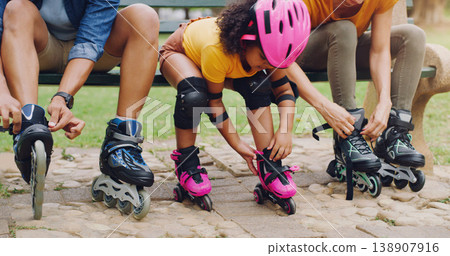 Family, children or rollerblade with a girl and parents in the park together for fun or recreation. Kids, love or learning with a mother, father and daughter bonding outdoor while rollerblading 138907916