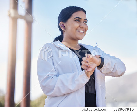 Woman, fitness and smartwatch, smile and happy with exercise, running time and heart rate outdoor. Young female with motivation, healthy and happiness with workout, runner or cardio goal and target Woman, fitness and smartwatch, smile and happy with exercise, running time and heart rate outdoor. Young female with motivation, healthy and happiness with workout, runner or cardio goal and target 138907919