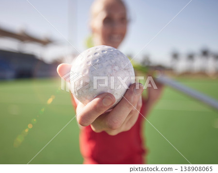 Sport, ball in hand and hockey on field with athlete and fitness outdoor for training on stadium turf. Hockey player, workout and sports closeup, field hockey and active with healthy lifestyle. Sport, ball in hand and hockey on field with athlete and fitness outdoor for training on stadium turf. Hockey player, workout and sports closeup, field hockey and active with healthy lifestyle. 138908065