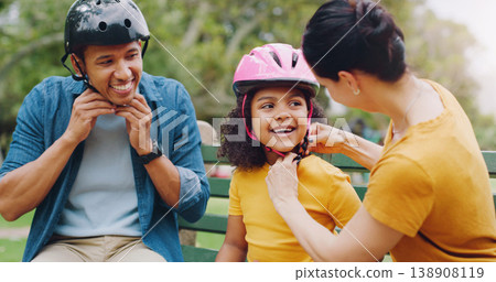 Parents, park bench and helmet with child, help and safety for skating, rollerskate or bike. Interracial parents, mom and dad with helping hand, teaching and kid for bonding, learning and exercise Parents, park bench and helmet with child, help and safety for skating, rollerskate or bike. Interracial parents, mom and dad with helping hand, teaching and kid for bonding, learning and exercise 138908119