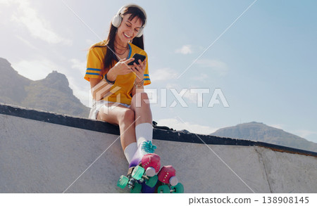 Smile, phone and music with woman and roller skates for skating, streaming and social media app. Technology, headphones and sports with girl in skate park for internet, mobile radio and fitness Smile, phone and music with woman and roller skates for skating, streaming and social media app. Technology, headphones and sports with girl in skate park for internet, mobile radio and fitness 138908145
