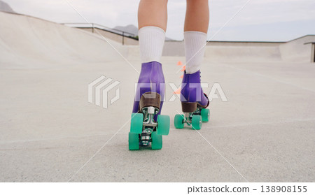 Freedom, skating and roller skates with shoes of woman outdoor park for training, hobby and health. Summer, sports and speed with girl skater and challenge course with cones for exercise or workout Freedom, skating and roller skates with shoes of woman outdoor park for training, hobby and health. Summer, sports and speed with girl skater and challenge course with cones for exercise or workout 138908155