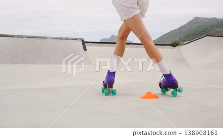 Fitness, skating and roller skates with shoes of woman in skate park for training, hobby and freedom. Summer, sports and speed with girl skater and challenge course with cones for exercise or workout 138908161
