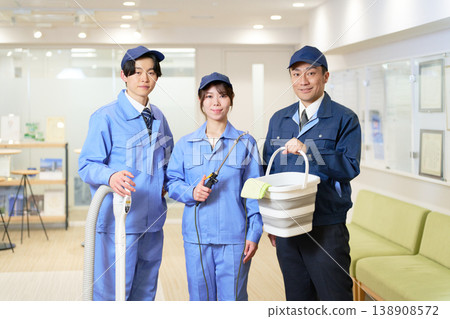 Group photo of male and female professional building maintenance staff. 138908572