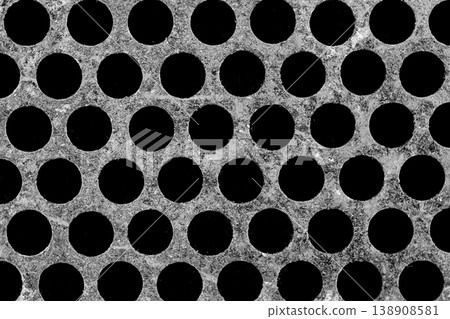 Metal old steel texture round patterns holes circle iron dirty abstract background structure black grey 138908581