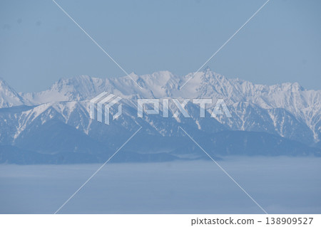 Snow-covered mountains as seen from Yatsugatake 138909527