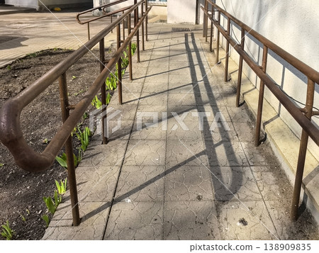 Accessibility Ramp with Handrails 138909835