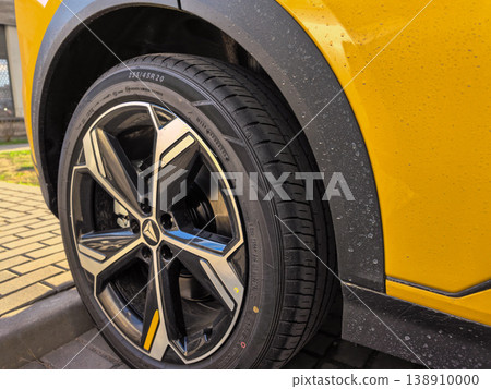Close-up of Modern Yellow SUV Car Wheel and Fender Close-up of Modern Yellow SUV Car Wheel and Fender 138910000