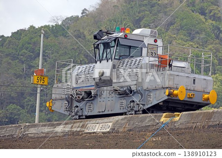 Panama Canal mule locomotive on lock wall 138910123
