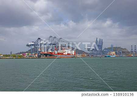 Cargo ships and cranes at Panama Canal Pacific port 138910136