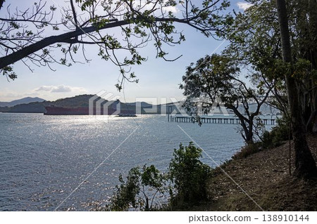 Cargo ship passing Panama Canal with bridge view Cargo ship passing Panama Canal with bridge view 138910144