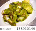 Italian octopus marinated in basil 138910149