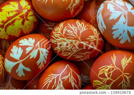 Easter eggs dyed with onion peel, dill and parsley. Natural eco dyes. Egg on the table top view food background. 138910678