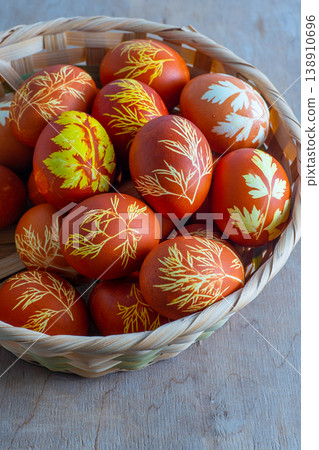 Easter eggs dyed with onion peel, dill and parsley. Natural eco dyes. Egg on the table top view food background. Easter eggs dyed with onion peel, dill and parsley. Natural eco dyes. Egg on the table top view food background. 138910696