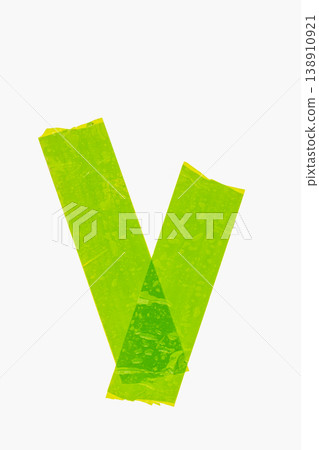 Green tape creating a distinct check mark symbol on a clean white surface, representing confirmation, approval, and success Green tape creating a distinct check mark symbol on a clean white surface, representing confirmation, approval, and success 138910921