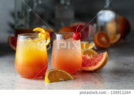 Iced cocktails with grapefruit and orange juice. Iced cocktails with grapefruit and orange juice. 138911264